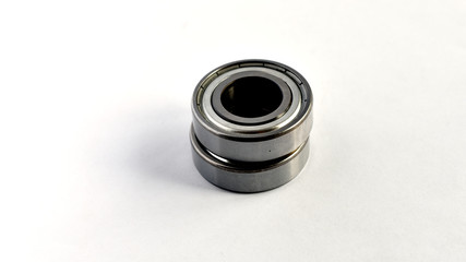 a pair of unpacked ball bearings