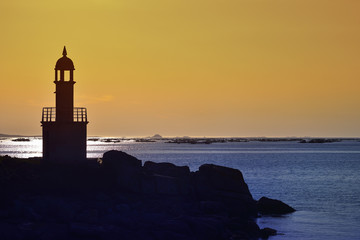 lighthouse in beautiful summer landscape of the Rias Baixas