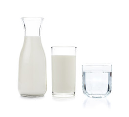 Glass and bottle of milk and drinking water on white background - 84251189
