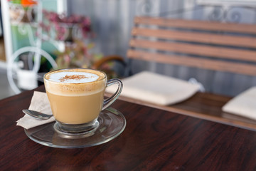 capucino coffee on wood background