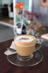 capucino coffee on wood background