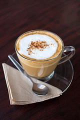 capucino coffee on wood background
