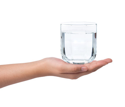 Female hand holding drinking water on white background