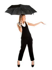 young girl in a business suit and carrying an umbrella in his ha