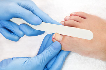 process of pedicure at beauty salon spa