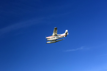 seaplane fly high in the blue sky