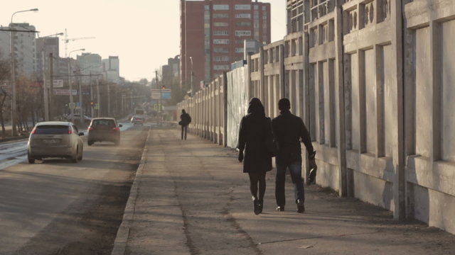Pedestrians walking on the Street Russian city