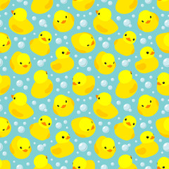 Seamless pattern with yellow rubber ducks