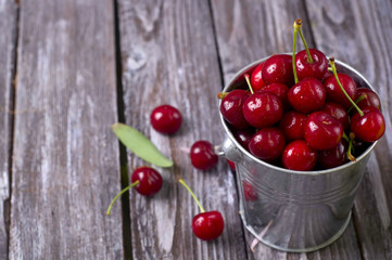 fresh cherries on wooden table