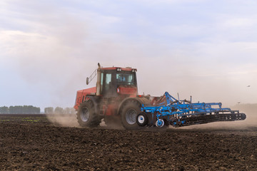 Fototapeta premium tractor with a trailer.