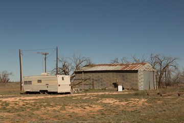 Fototapeta na wymiar Abandoned Trailer and Barn