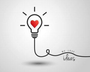 Light bulb with heart as idea and inspiration concept