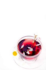 Cup of tea with teabag over white
