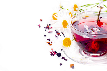 Cup of tea with teabag over white