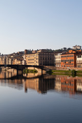 view on bridge on arno river in florence in italy 