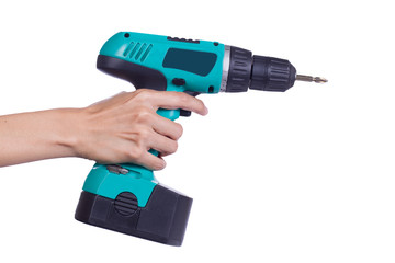 Hand with cordless screwdriver or drill isolated on a white back