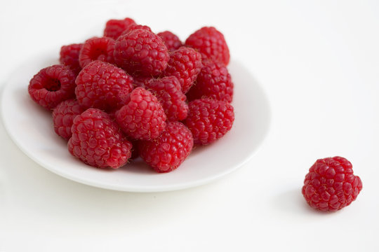 raspberry on the white plate