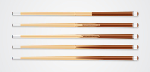Billiard cue sticks on white background