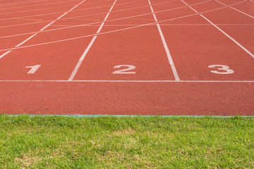 Start track lanes 1 2 3 of a red racing track