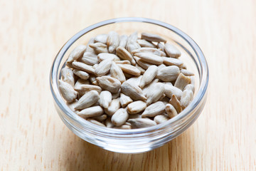 Sunflower seeds in glass bowl