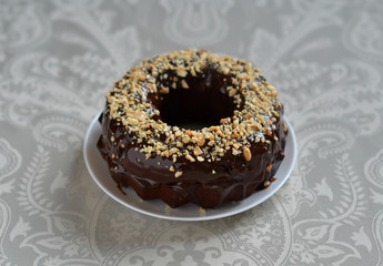 chocolate cake with chocolate frosting and nuts 