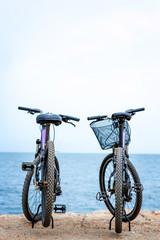 Fototapeta premium Two bicycles on the pier