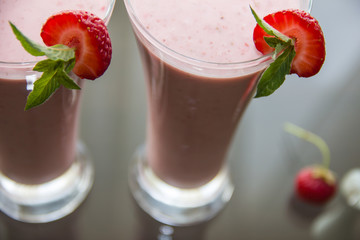  decor of strawberry and mint for strawberry smoothie, closeup 