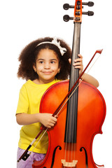 African girl holding violoncello and playing © Sergey Novikov