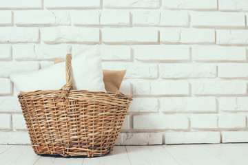 Wicker basket with a pillow