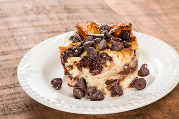 Chocolate chip bread pudding on plate