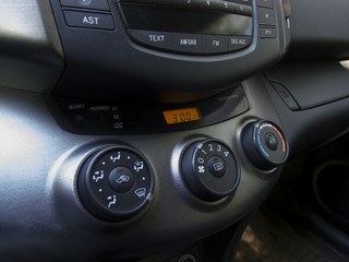 Modern car interior with dashboard and cockpit details
