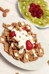 Healthy meal with fruits, cereals and nuts