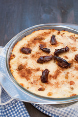 Casserole of cottage cheese with raisins, dates