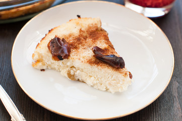 Piece of cottage cheese casserole with raisins