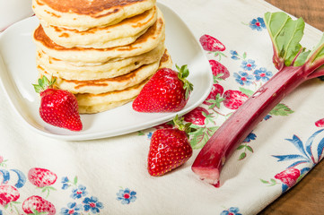 Stack of pancakes with strawberries