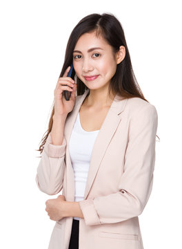 Asian young businesswoman talk to cellphone