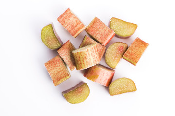 chopped red rhubarb on white background
