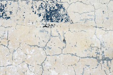 Obraz premium Old wall with traces of paint and plaster.