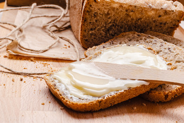 Still life fresh bread with butter and honey