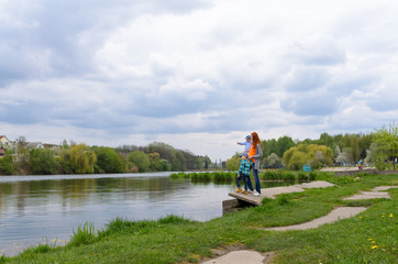 mother on a walk with children by two sons