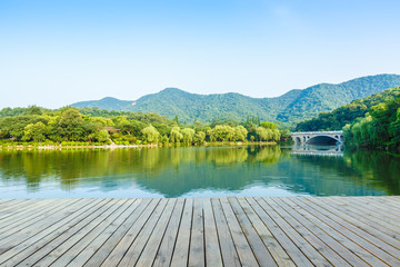 platform beside lake with  morning in park