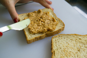 Making peanut butter sandwiches