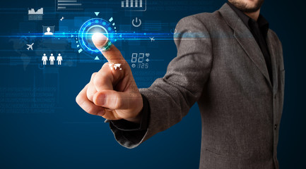 Handsome businessman touching future web technology buttons and