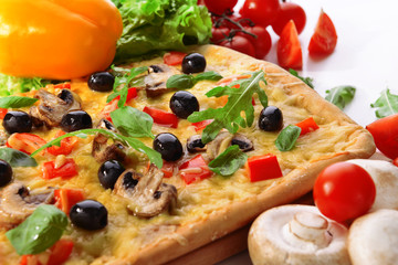 Delicious homemade pizza on white background