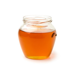 Honey jar on white background