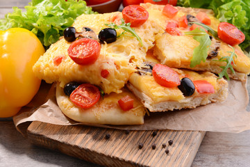 Delicious homemade pizza on table close-up