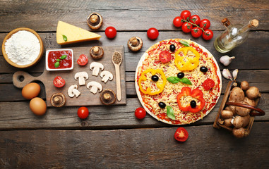 Food ingredients for pizza on table close up