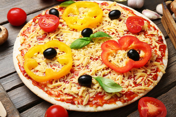 Food ingredients for pizza on table close up