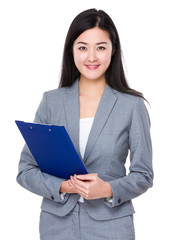 Fototapeta premium Young businesswoman hold with clipboard