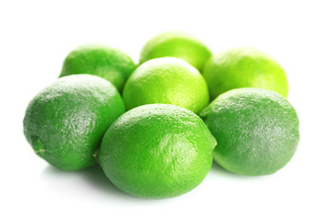 Group of fresh limes isolated on white